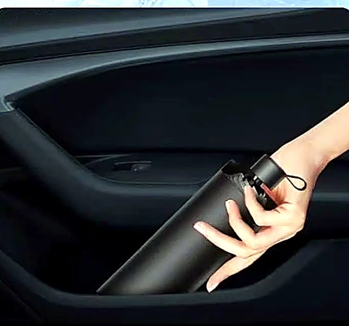 Folded SunShield stored in a car door pocket